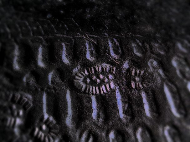 Reversed boot print inn the sand